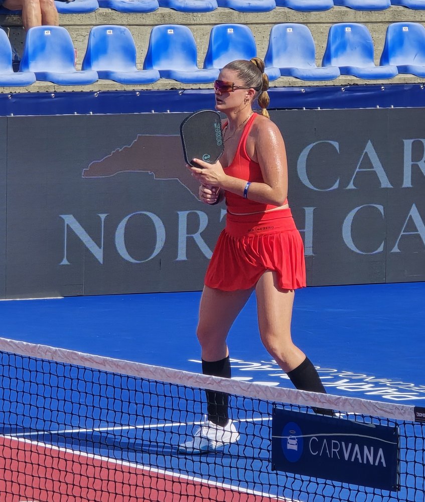Cailyn Campbell at the net on center court at the Veolia Pickleball National Championships in Cary, NC