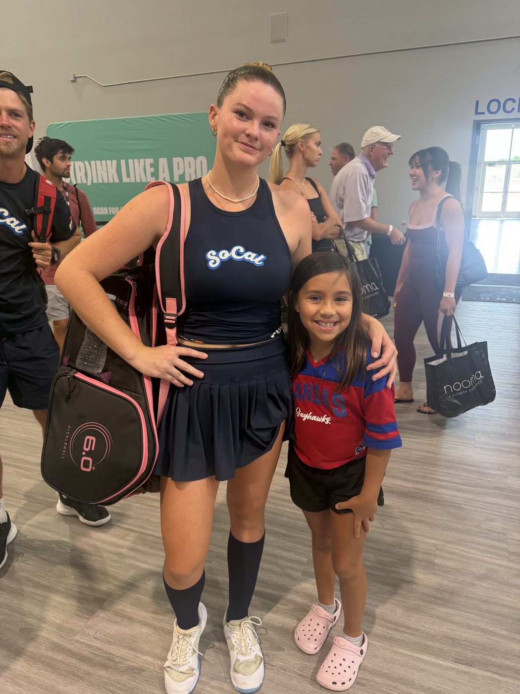 Cailyn Campbell with a young fan
